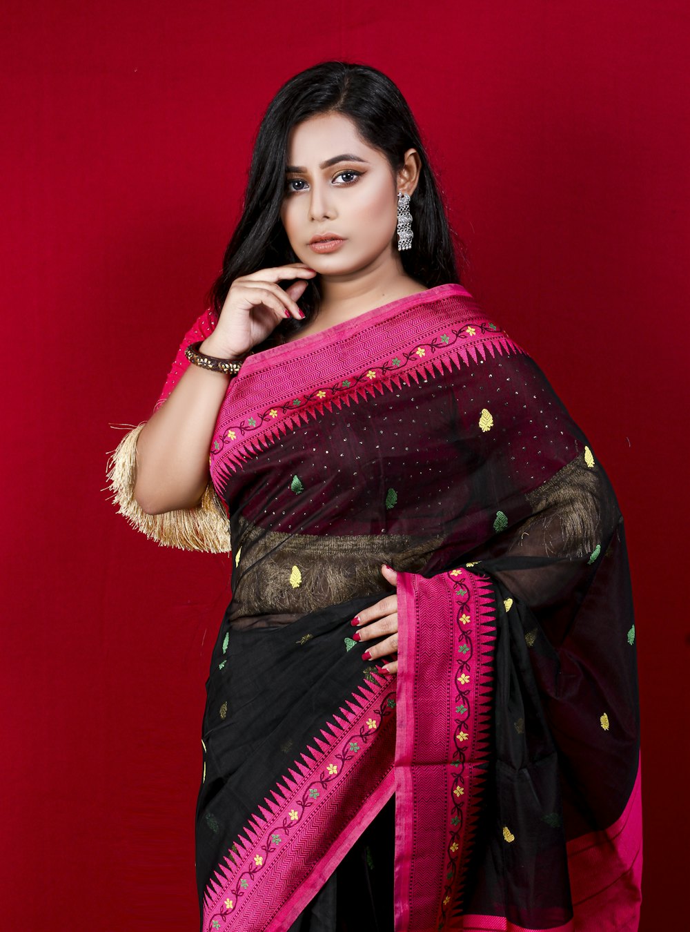 A model in a saree from the Evening blacks edit
